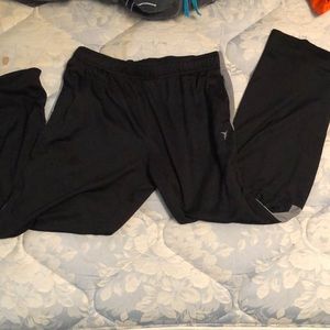 Dry fit pants with a grey stripe down the sides